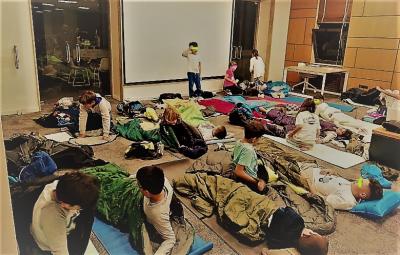 The School's library hosts the first sleepover for young students
